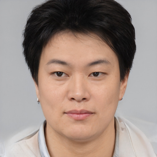 Neutral asian young-adult female with short  brown hair and brown eyes