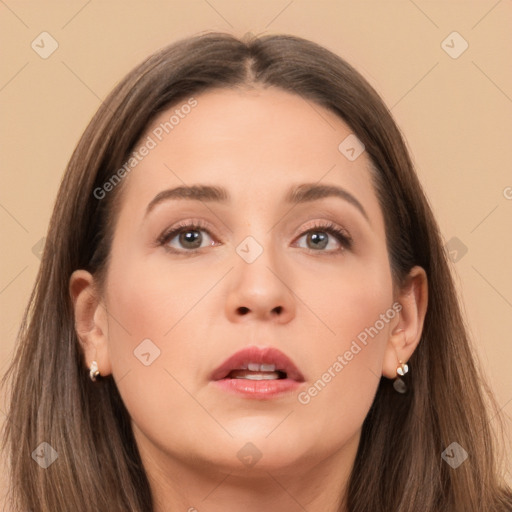 Neutral white young-adult female with long  brown hair and brown eyes