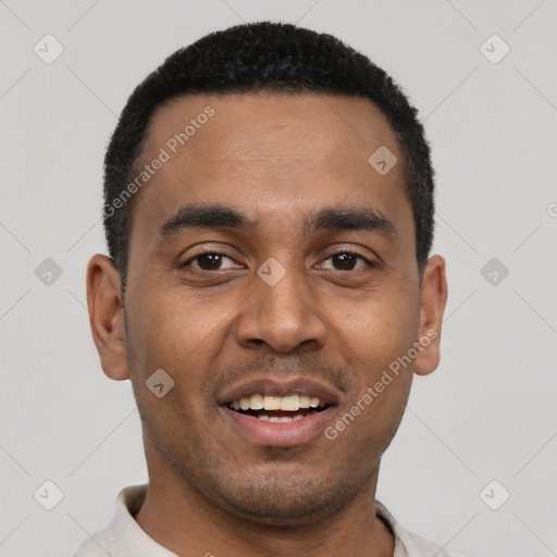 Joyful black young-adult male with short  black hair and brown eyes