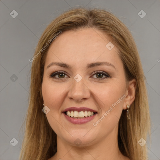 Joyful white young-adult female with long  brown hair and brown eyes