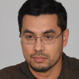 Neutral white young-adult male with short  black hair and brown eyes