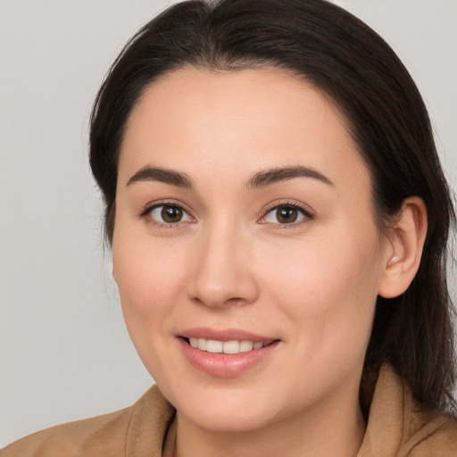 Joyful white young-adult female with medium  brown hair and brown eyes