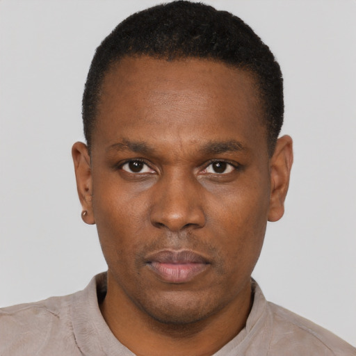 Neutral black young-adult male with short  black hair and brown eyes