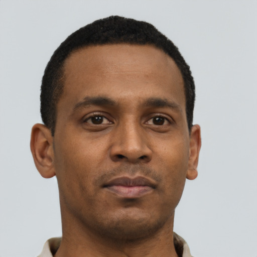 Neutral black young-adult male with short  brown hair and brown eyes