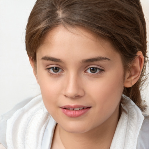 Joyful white child female with medium  brown hair and brown eyes