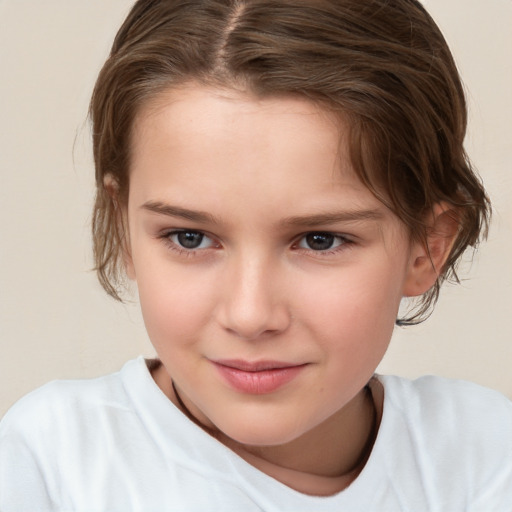 Joyful white child female with medium  brown hair and brown eyes