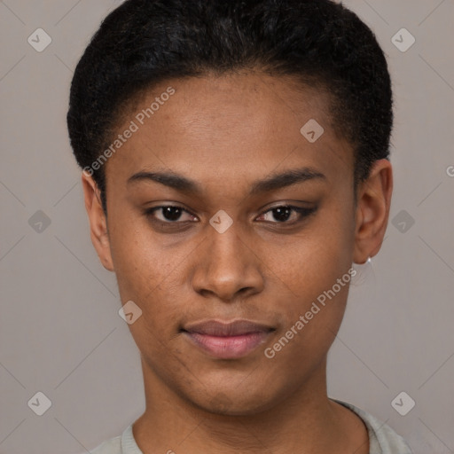 Joyful black young-adult female with short  brown hair and brown eyes