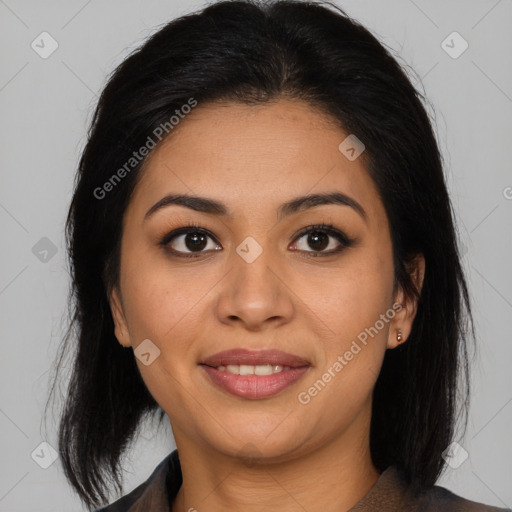 Joyful latino young-adult female with long  brown hair and brown eyes