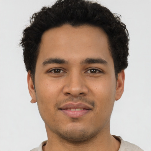 Neutral latino young-adult male with short  brown hair and brown eyes