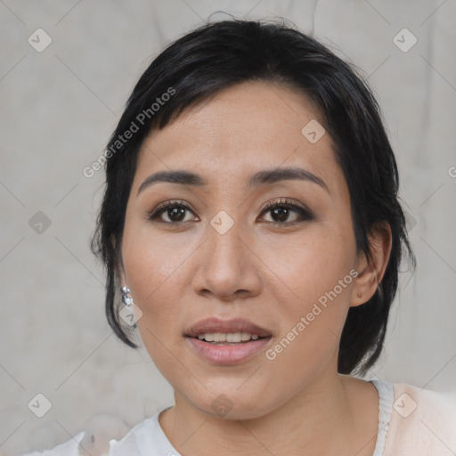 Joyful asian young-adult female with medium  black hair and brown eyes