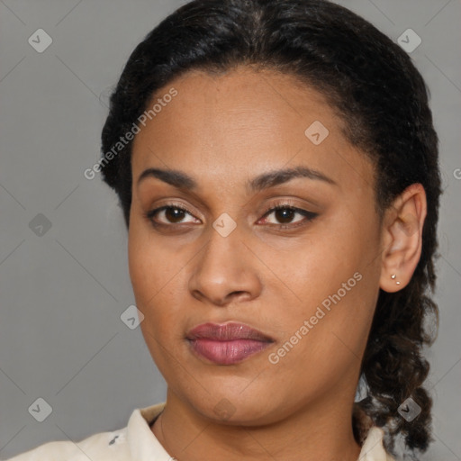 Joyful latino young-adult female with medium  brown hair and brown eyes