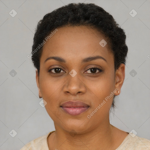 Joyful black young-adult female with short  black hair and brown eyes