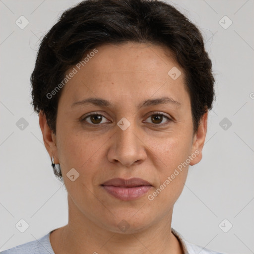 Joyful white adult female with short  brown hair and brown eyes