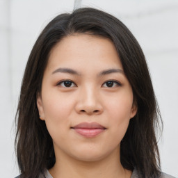 Neutral asian young-adult female with long  brown hair and brown eyes