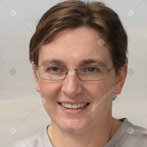 Joyful white adult female with short  brown hair and grey eyes