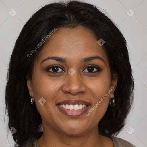 Joyful black young-adult female with medium  brown hair and brown eyes