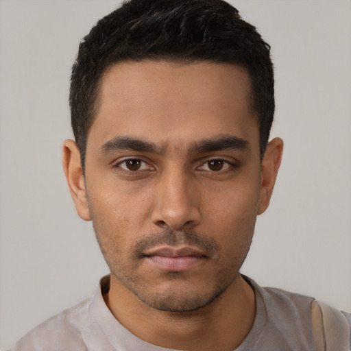Neutral latino young-adult male with short  black hair and brown eyes