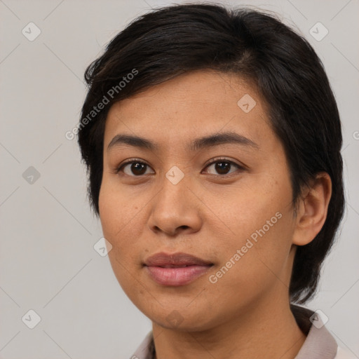 Joyful asian young-adult female with medium  brown hair and brown eyes