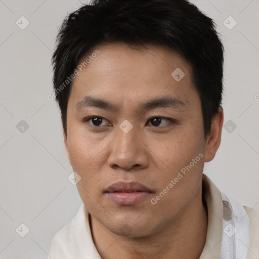 Neutral white young-adult male with short  black hair and brown eyes