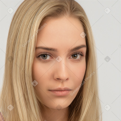 Neutral white young-adult female with long  brown hair and brown eyes