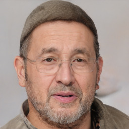 Joyful white middle-aged male with short  brown hair and brown eyes