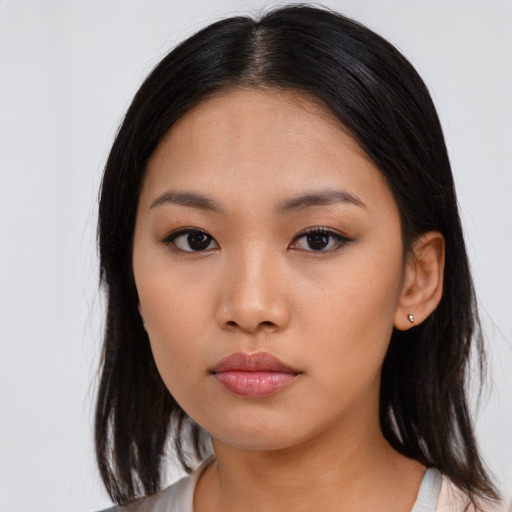 Neutral asian young-adult female with medium  black hair and brown eyes