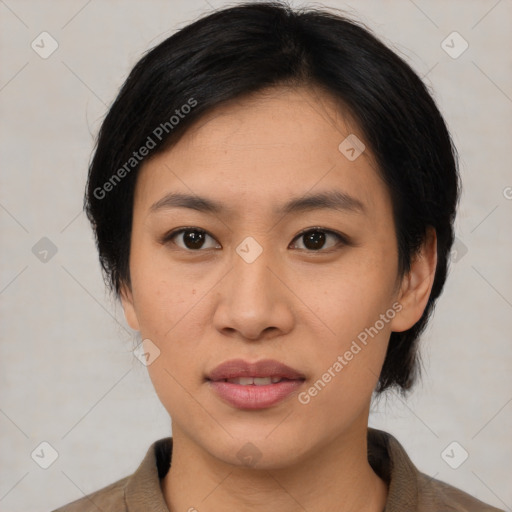 Joyful asian young-adult female with medium  black hair and brown eyes