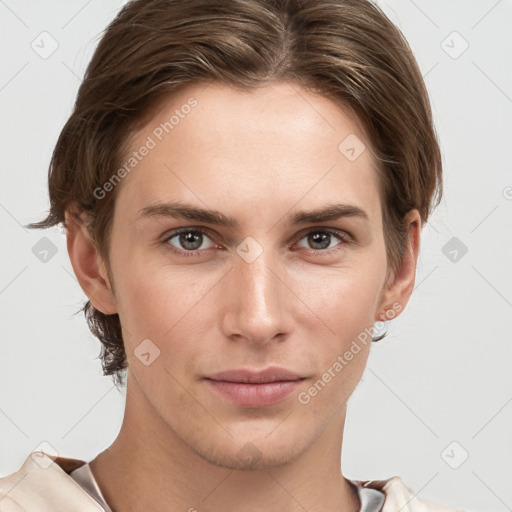 Joyful white young-adult female with short  brown hair and grey eyes