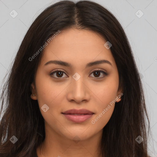 Joyful latino young-adult female with long  brown hair and brown eyes