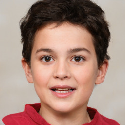 Joyful white child male with short  brown hair and brown eyes