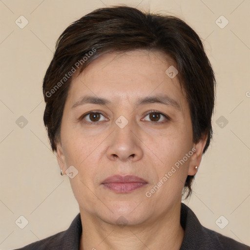 Joyful white adult female with short  brown hair and brown eyes