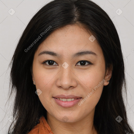 Joyful asian young-adult female with long  brown hair and brown eyes