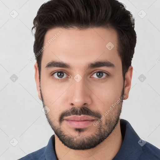 Neutral white young-adult male with short  brown hair and brown eyes