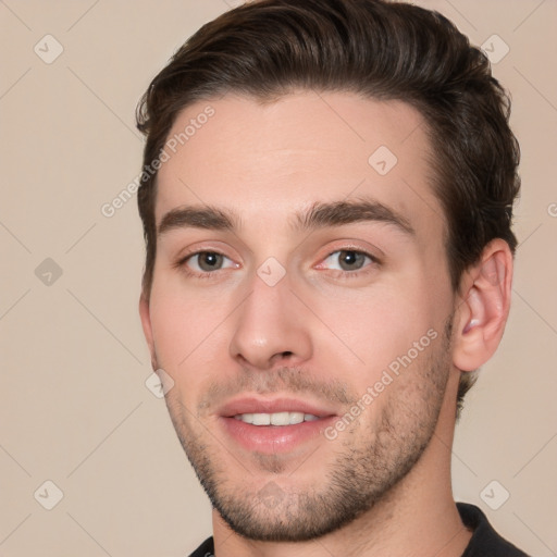 Joyful white young-adult male with short  brown hair and brown eyes