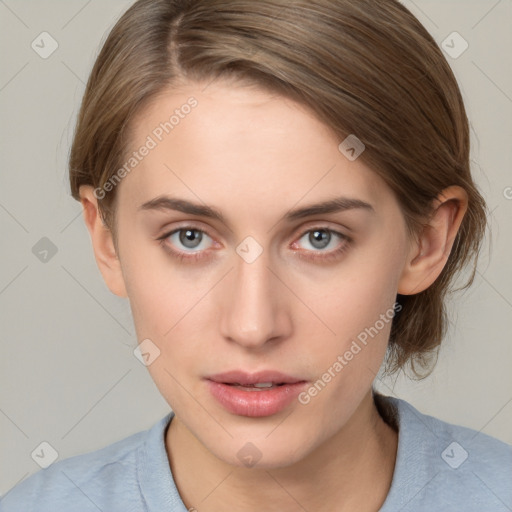 Neutral white young-adult female with medium  brown hair and grey eyes