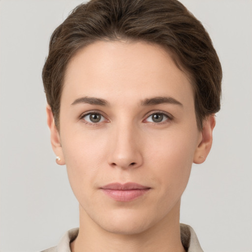 Neutral white young-adult female with short  brown hair and brown eyes