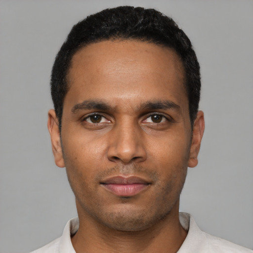 Neutral black young-adult male with short  black hair and brown eyes