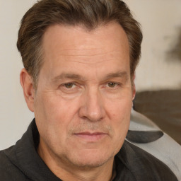 Neutral white middle-aged male with short  brown hair and brown eyes