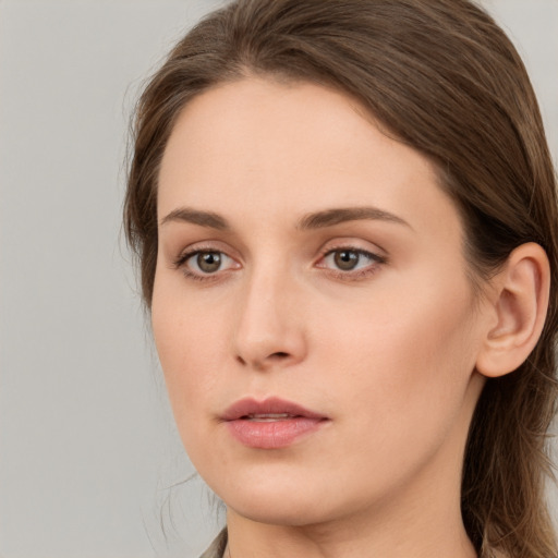 Neutral white young-adult female with long  brown hair and grey eyes