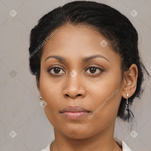 Joyful black young-adult female with medium  brown hair and brown eyes