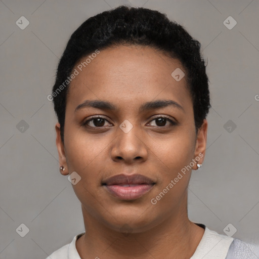 Joyful black young-adult female with short  black hair and brown eyes