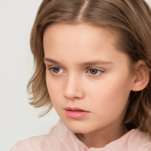 Neutral white child female with medium  brown hair and brown eyes