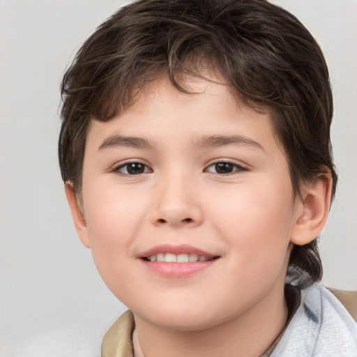 Joyful white child female with medium  brown hair and brown eyes