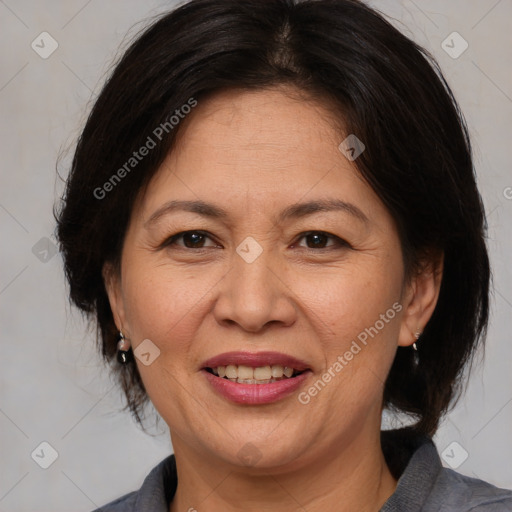 Joyful white adult female with medium  brown hair and brown eyes