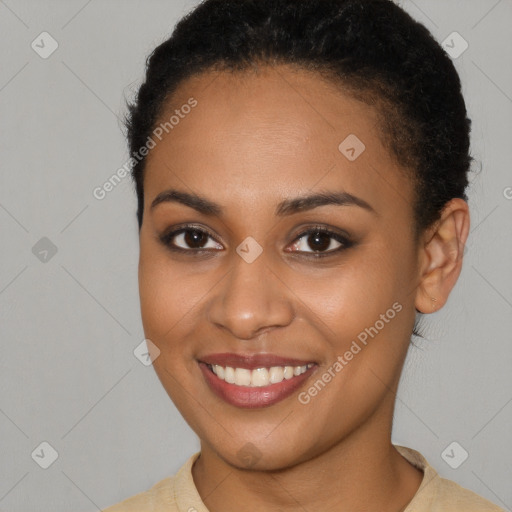 Joyful latino young-adult female with short  brown hair and brown eyes