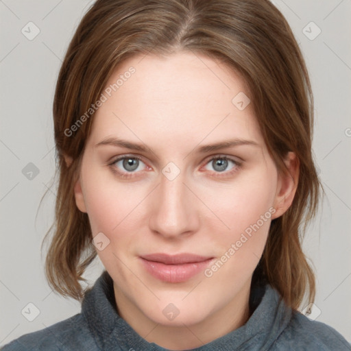 Joyful white young-adult female with medium  brown hair and blue eyes