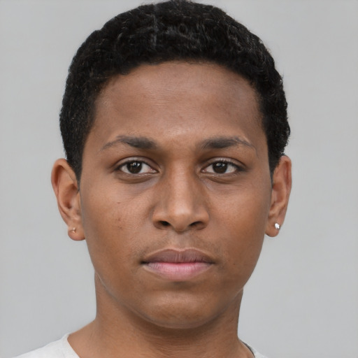 Neutral black young-adult male with short  brown hair and brown eyes
