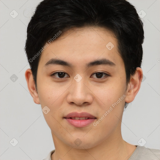Joyful asian young-adult female with short  black hair and brown eyes