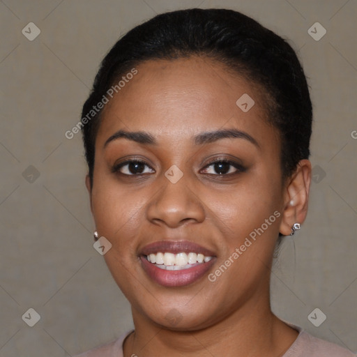 Joyful latino young-adult female with short  black hair and brown eyes