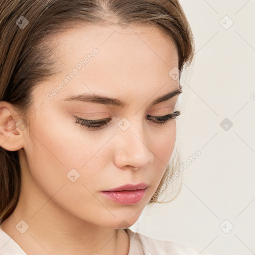 Neutral white young-adult female with medium  brown hair and brown eyes